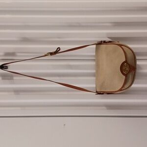 Vintage Dooney and Bourke all weather leather crossbody bag
